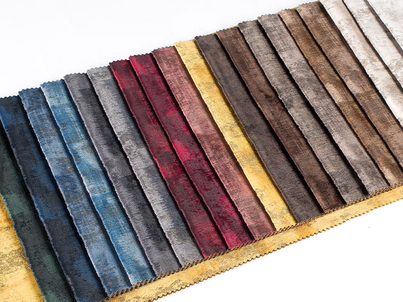 Tessuto di velluto laminato tinto di qualità premium, consistenza liscia e brillante