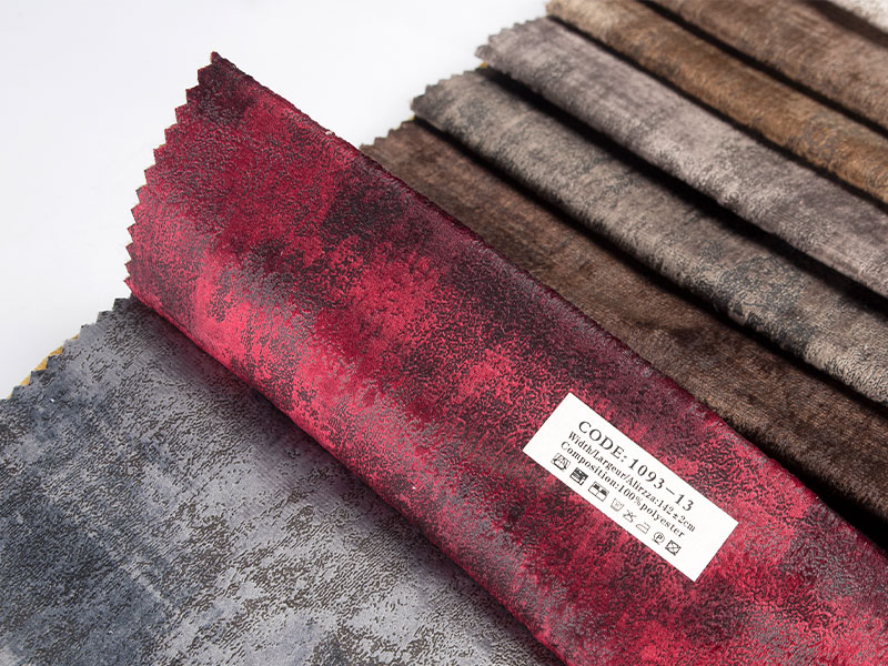 Tessuto di velluto laminato tinto di qualità premium, consistenza liscia e brillante